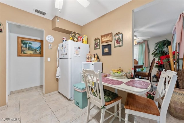 dining space featuring ceiling fan