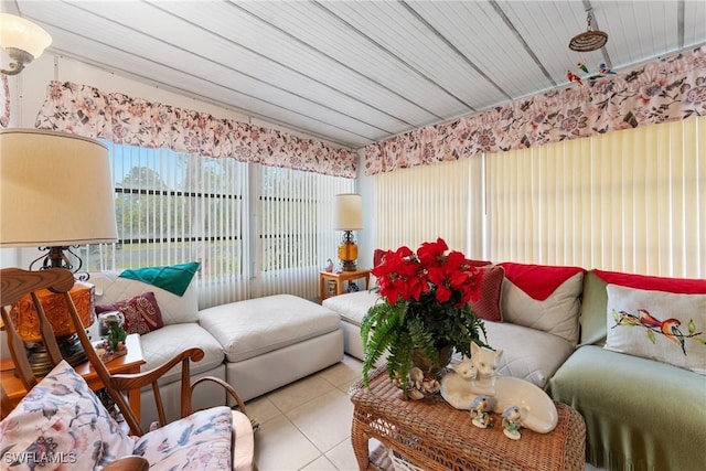 living room with light tile patterned floors and wood ceiling