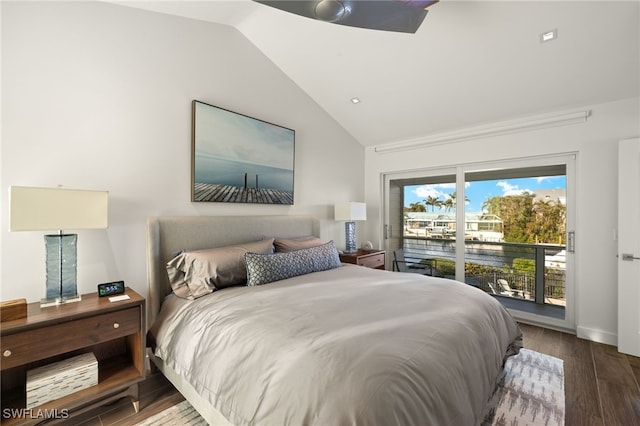 bedroom featuring hardwood / wood-style flooring, access to exterior, and vaulted ceiling