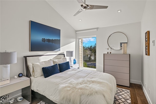 bedroom featuring ceiling fan, dark hardwood / wood-style flooring, and lofted ceiling