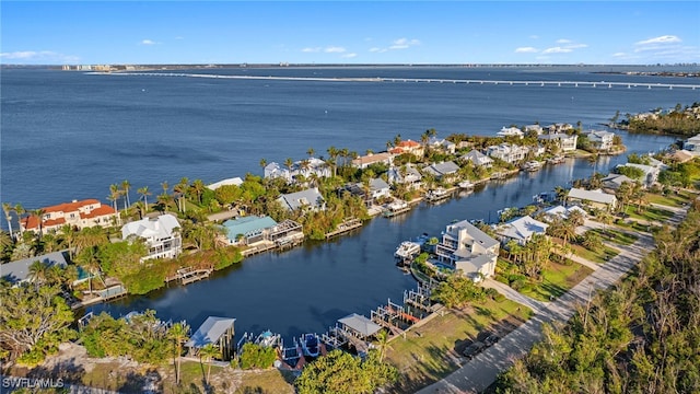 bird's eye view with a water view