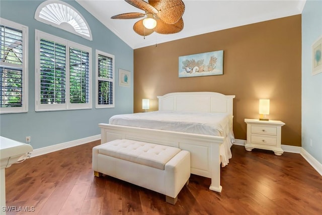 bedroom featuring a ceiling fan, dark wood-style flooring, vaulted ceiling, and baseboards