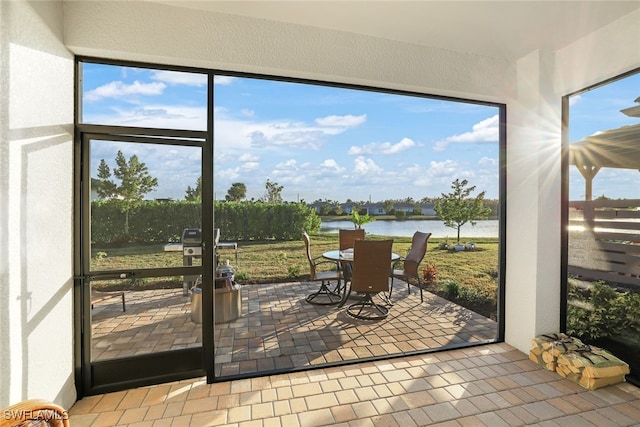 doorway featuring a water view