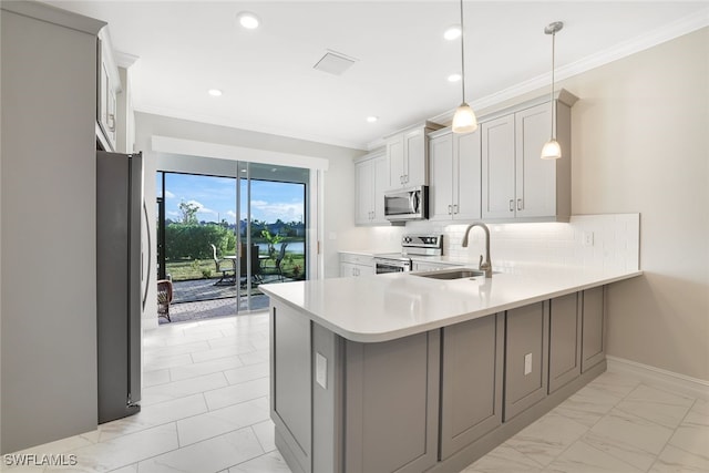 kitchen with kitchen peninsula, tasteful backsplash, stainless steel appliances, sink, and pendant lighting