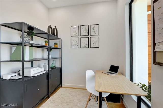 home office featuring hardwood / wood-style flooring