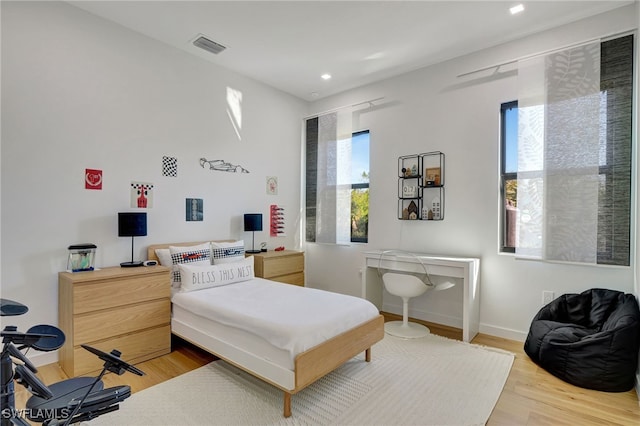 bedroom featuring hardwood / wood-style flooring