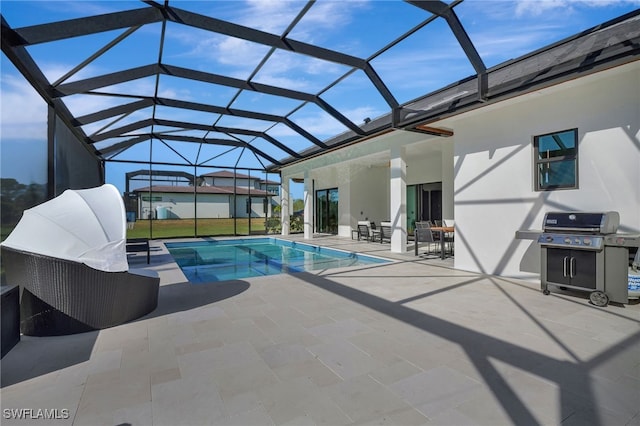 view of pool featuring a lanai, grilling area, and a patio