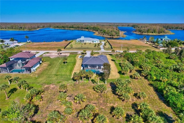 birds eye view of property featuring a water view