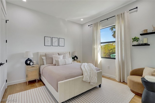 bedroom featuring light hardwood / wood-style floors