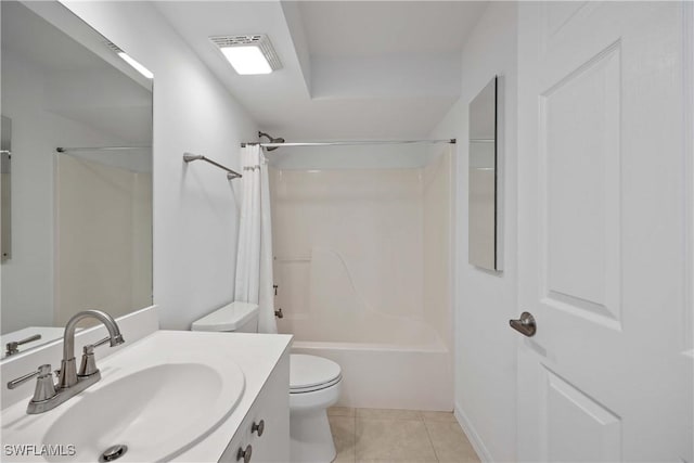 full bathroom featuring toilet, vanity, tile patterned floors, and shower / tub combo with curtain