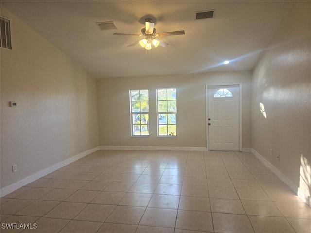 entryway featuring ceiling fan and light tile patterned floors