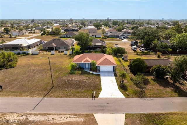 2207 NE 16th Pl, Cape Coral, FL 33909 - birds eye view of property featuring a residential view