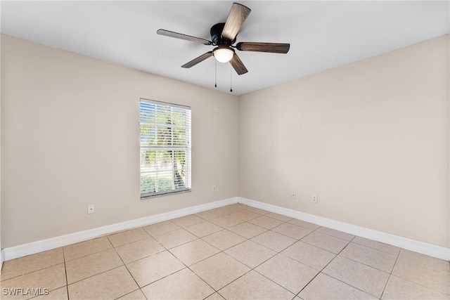 2207 NE 16th Pl, Cape Coral, FL 33909 - unfurnished room with light tile patterned floors and baseboards