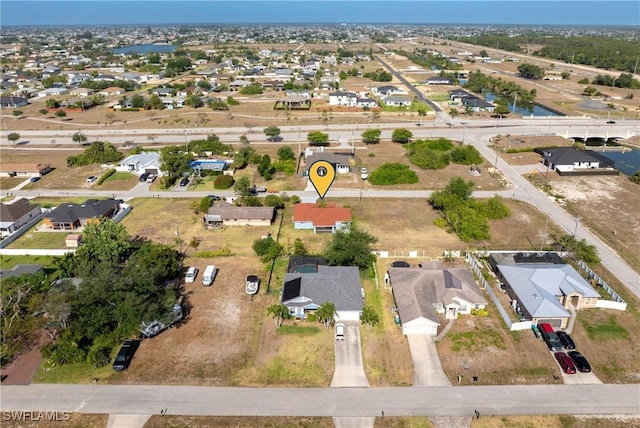 2207 NE 16th Pl, Cape Coral, FL 33909 - drone / aerial view with a residential view