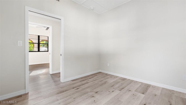 empty room with light hardwood / wood-style floors