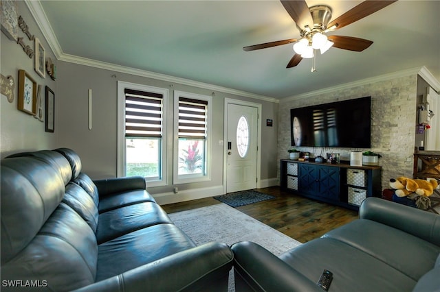 living room with ceiling fan, dark hardwood / wood-style flooring, and ornamental molding