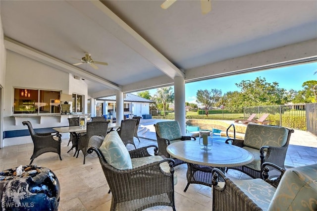 view of patio with ceiling fan