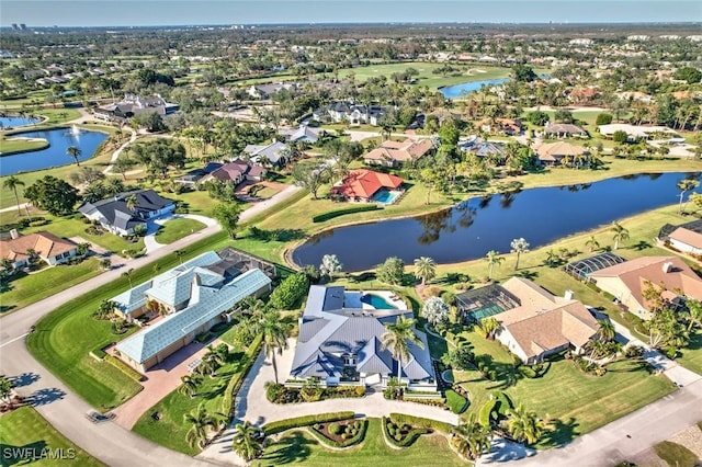 bird's eye view with a water view