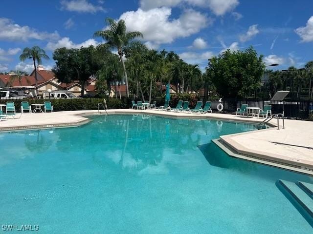 20190 Golden Panther Dr Unit 3, Estero, FL 33928 - community pool with a patio