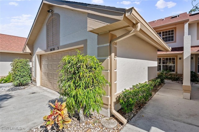 exterior space featuring a garage