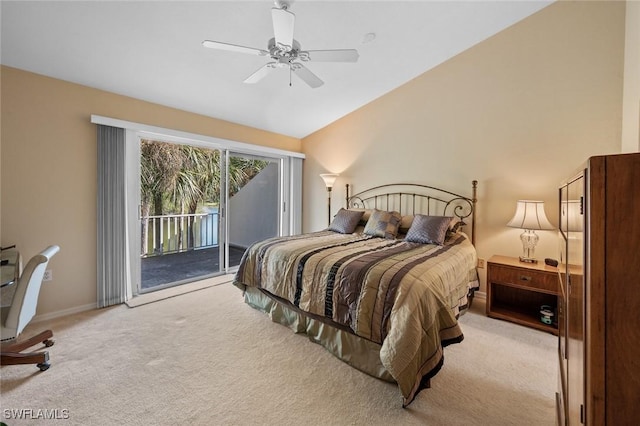 carpeted bedroom with access to outside, vaulted ceiling, and ceiling fan