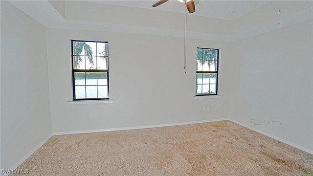 26217 Palace Ln Unit 102, Bonita Springs, FL 34135 - spare room with healthy amount of natural light, carpet floors, and a ceiling fan