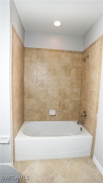 26217 Palace Ln Unit 102, Bonita Springs, FL 34135 - full bathroom with shower / bath combination and tile patterned flooring