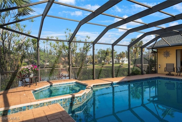 view of pool featuring a lanai and a patio