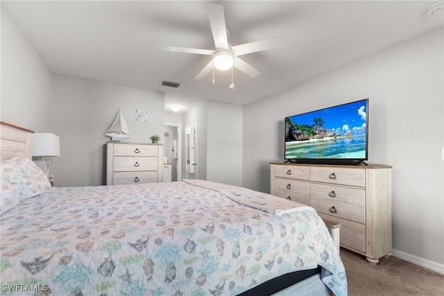 bedroom with ceiling fan and light colored carpet