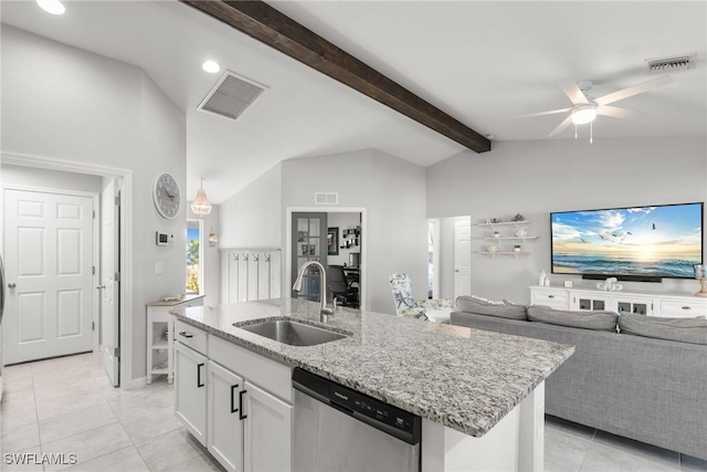 kitchen featuring white cabinets, sink, dishwasher, vaulted ceiling with beams, and an island with sink