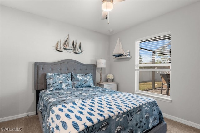 carpeted bedroom featuring ceiling fan