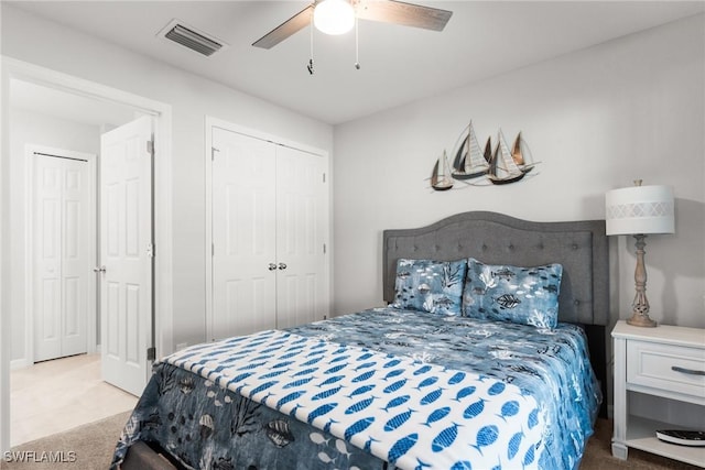 carpeted bedroom with ceiling fan