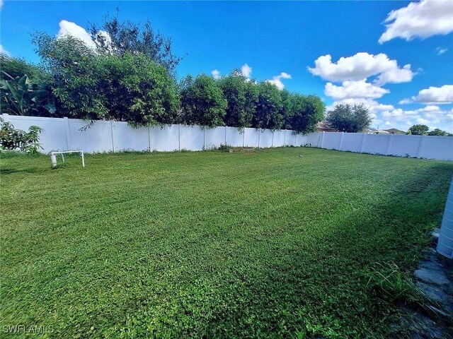 view of yard featuring fence