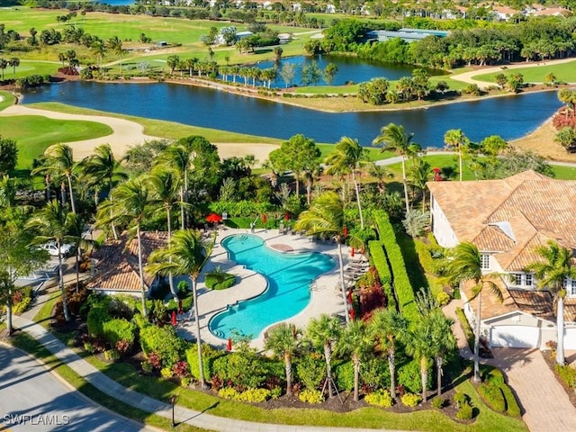 drone / aerial view with a water view