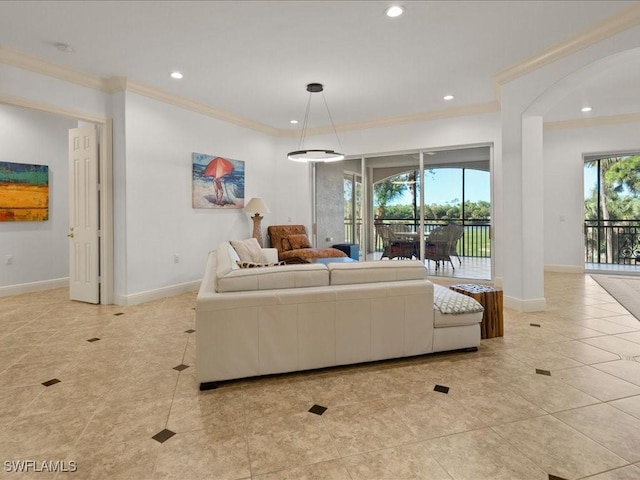 living room featuring crown molding, plenty of natural light, and light tile patterned flooring