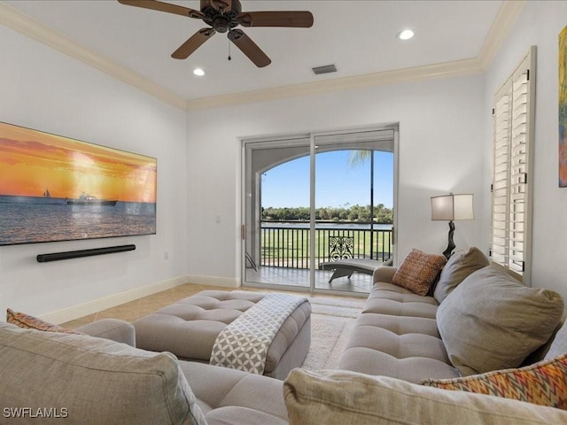 living room featuring ceiling fan and ornamental molding