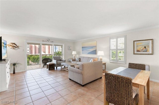 living room featuring light tile patterned floors and ornamental molding