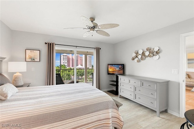 bedroom with access to outside, ceiling fan, and light hardwood / wood-style flooring