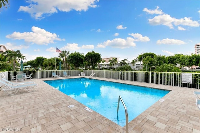 view of pool with a patio area