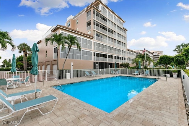 view of pool featuring a patio area