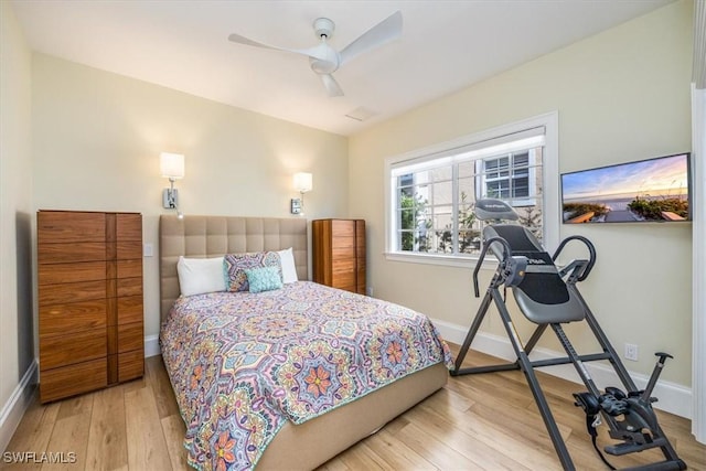 bedroom featuring ceiling fan and light wood-type flooring