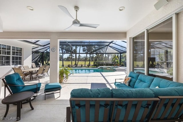 view of patio featuring an outdoor living space, a swimming pool with hot tub, a lanai, and ceiling fan