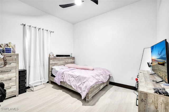 bedroom featuring ceiling fan and hardwood / wood-style flooring