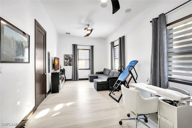 home office with light wood-type flooring