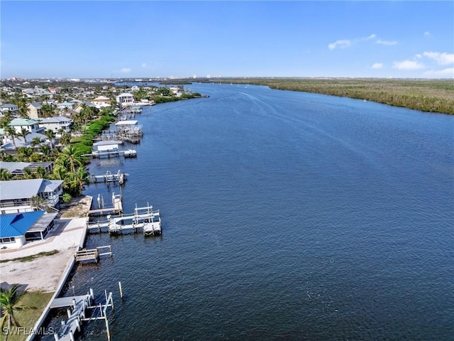 drone / aerial view featuring a water view