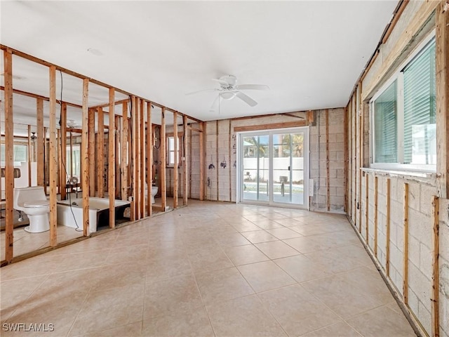 miscellaneous room featuring ceiling fan