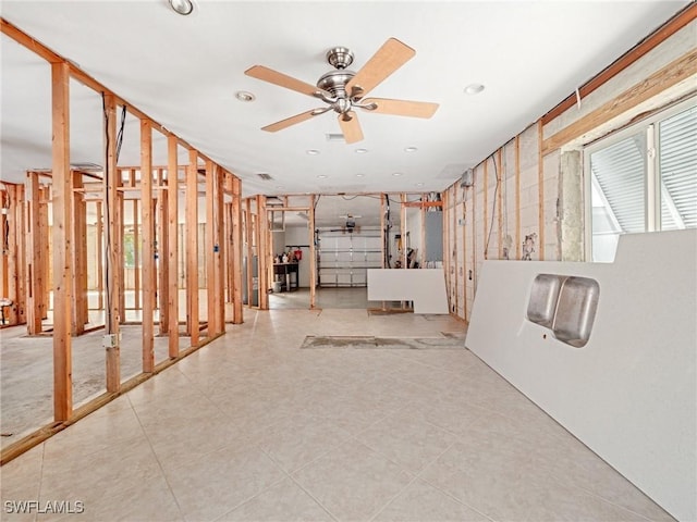 interior space featuring ceiling fan