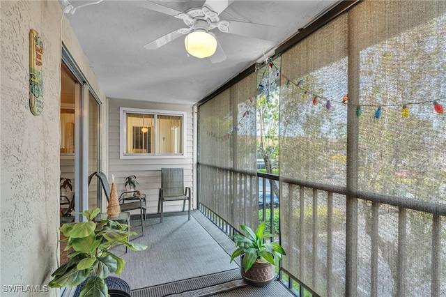 balcony featuring ceiling fan