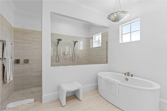 bathroom featuring crown molding, plus walk in shower, and an inviting chandelier