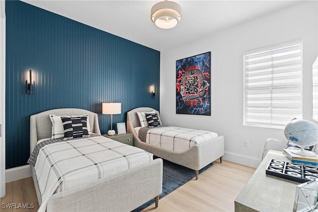 bedroom featuring light hardwood / wood-style floors